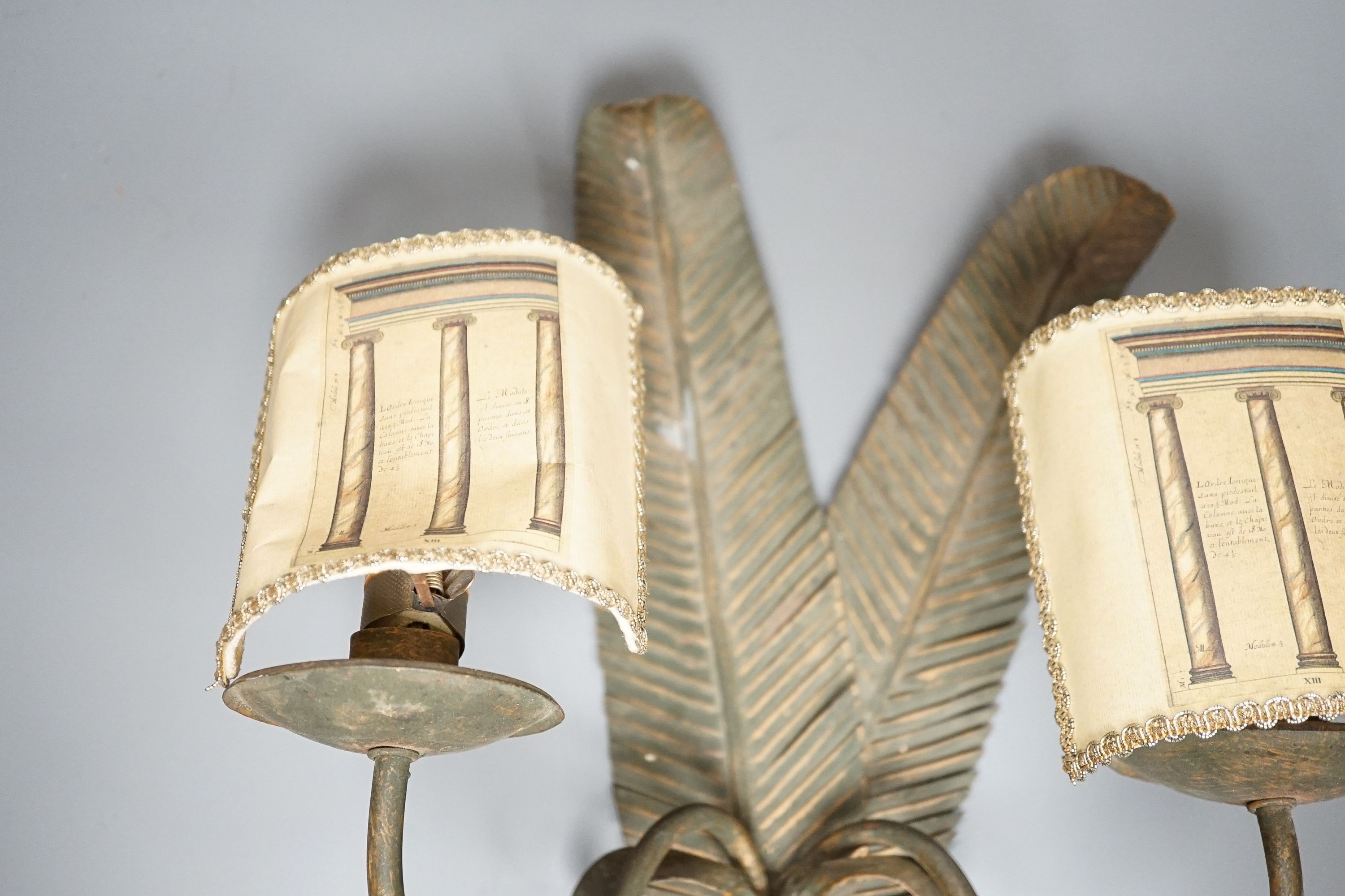 A pair of two branch ‘feather quill’ wall sconces, height 35cm